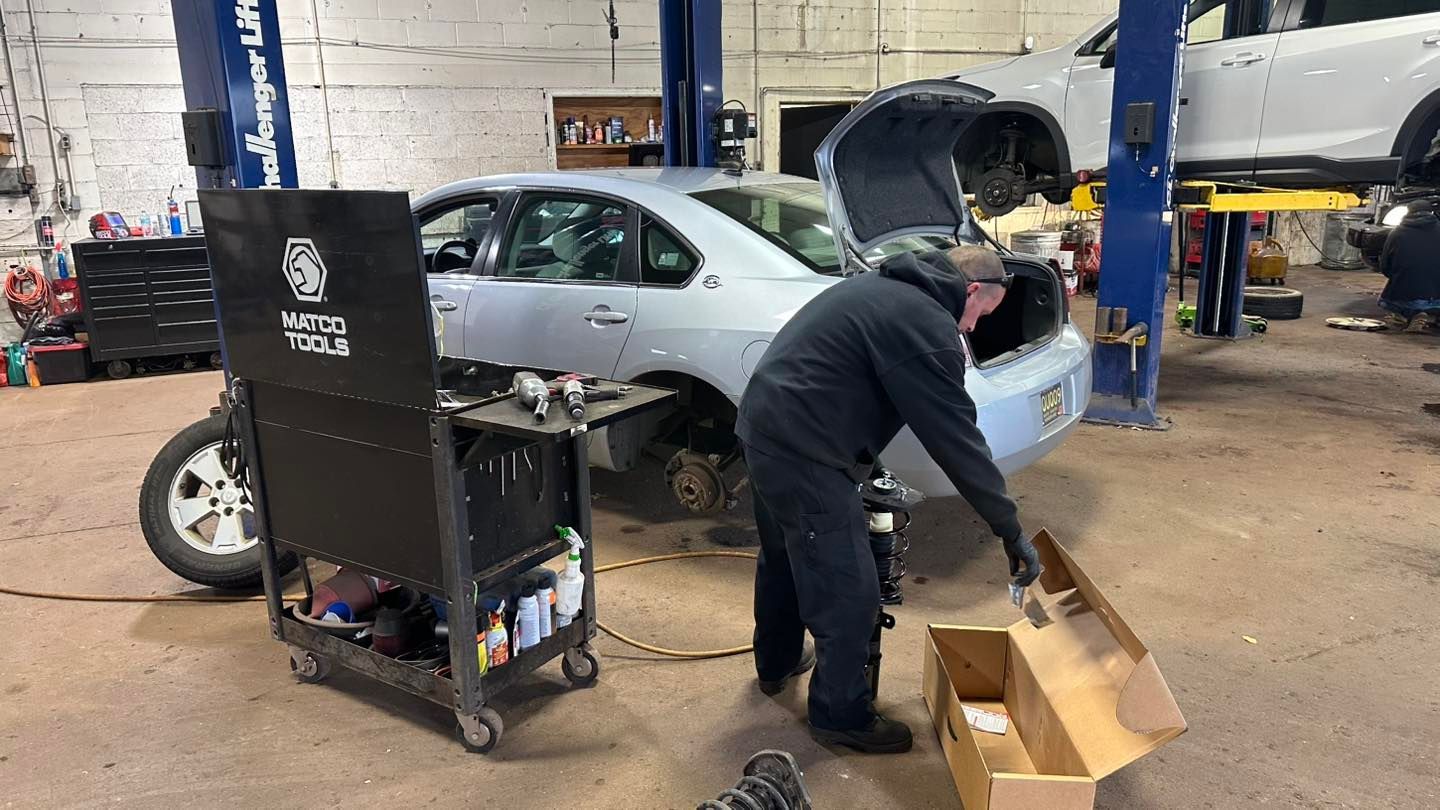 Mechanic Servicing a Vehicle | Tire City Auto Repair