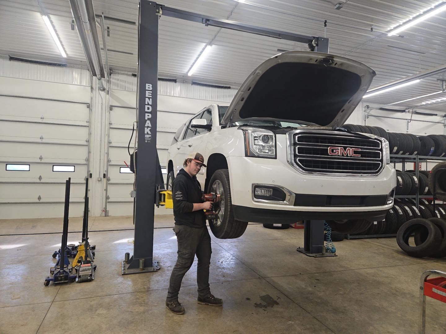 Mechanic Installing Tire | Tire City Auto Repair