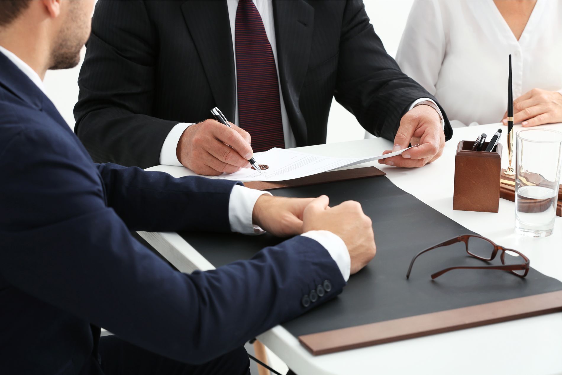 A group of attorneys discussing a case with a client