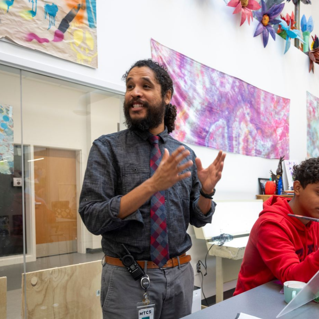 AAC stock image of teacher in classroom