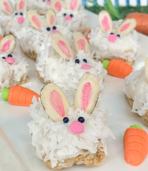 granola bars topped with coconut flakes and decorated to look like bunnies