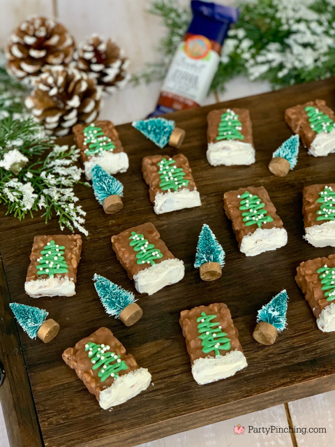 fudge dipped chocolate chip bars decorated with green christmas trees and sprinkles dipped in white chocolate