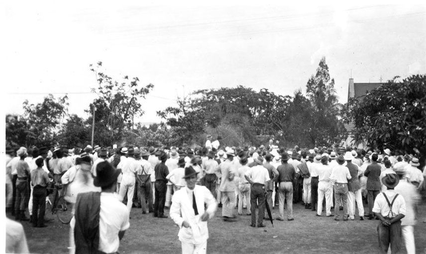 A black and white photo of a crowd of people