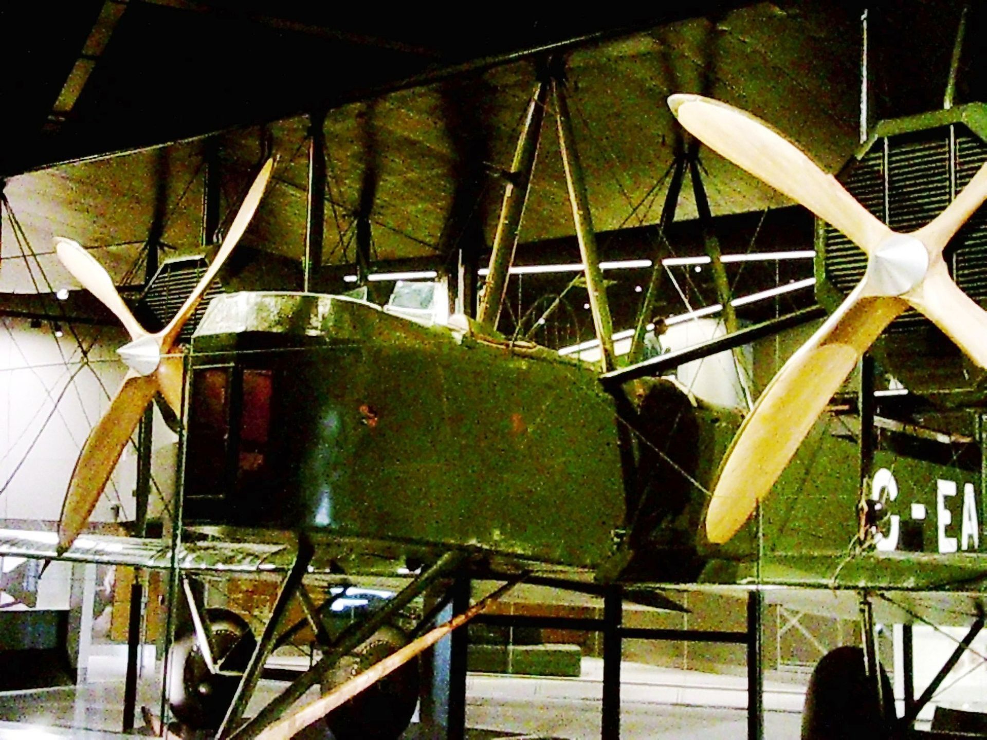 A green plane with g-ea written on the side