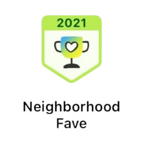 A badge that says neighborhood fave on it