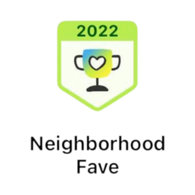 A badge that says neighborhood fave on it