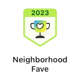 A badge that says neighborhood fave on it