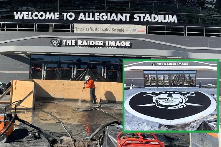 A man is standing in front of a building that says welcome to allegiant stadium