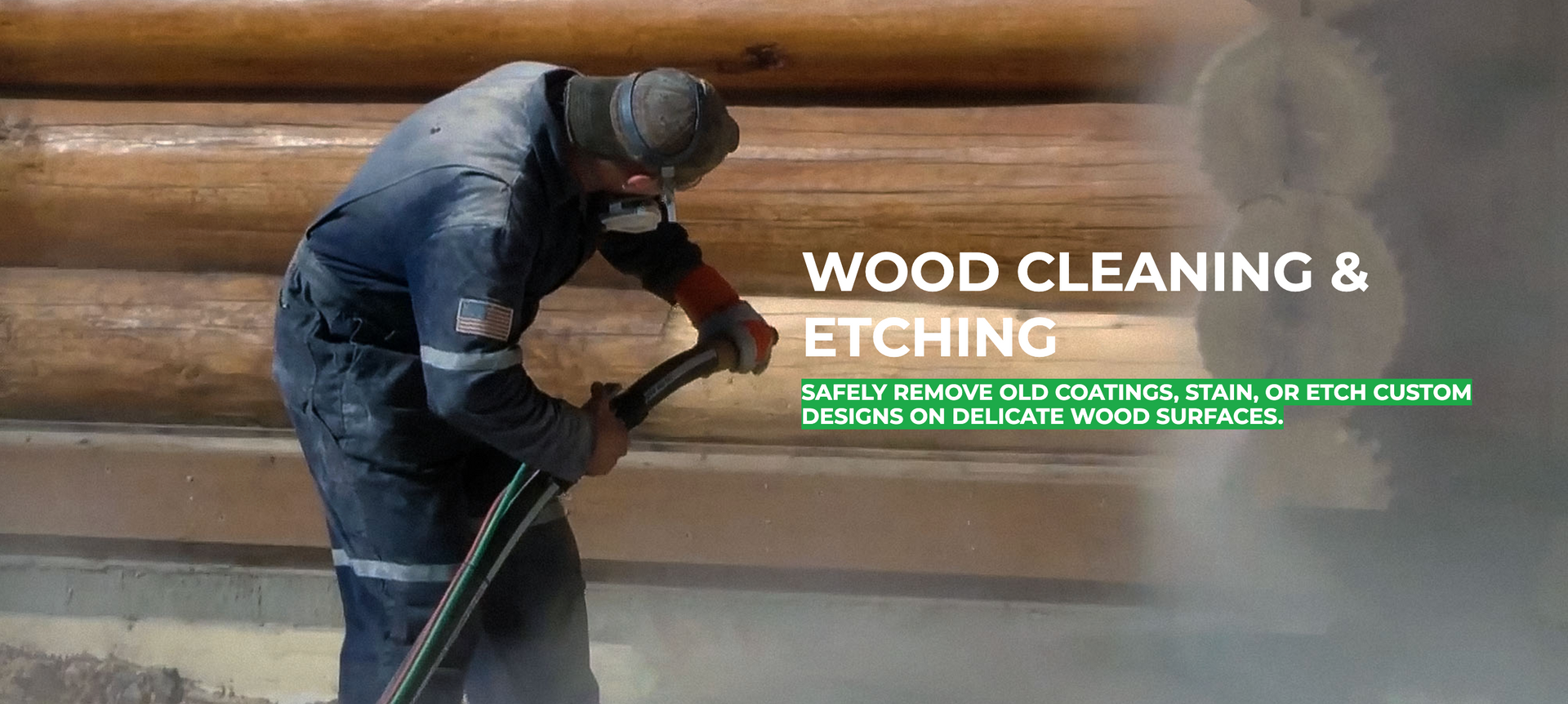 A man is cleaning a log cabin with a vacuum cleaner