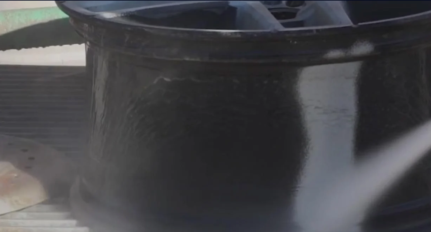 Blasting Automobile Wheels removing paints and primer easily.