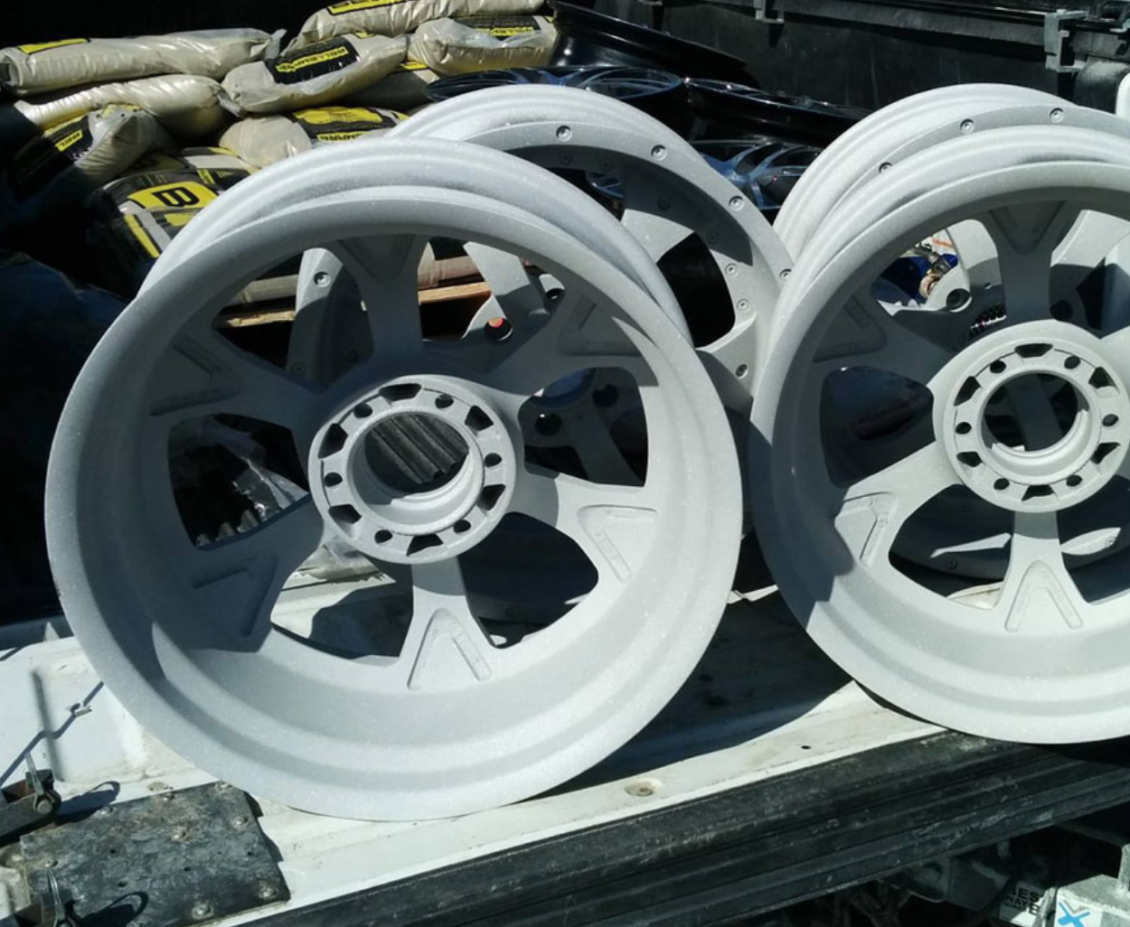 A bunch of white wheels are sitting on a table