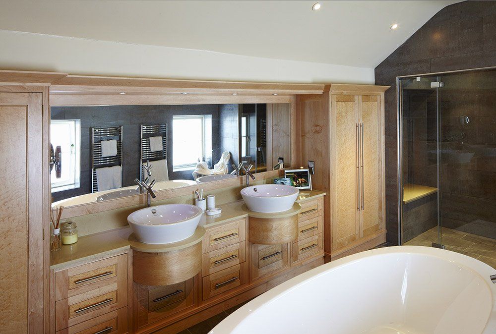 Modern bathroom with wooden cupboards