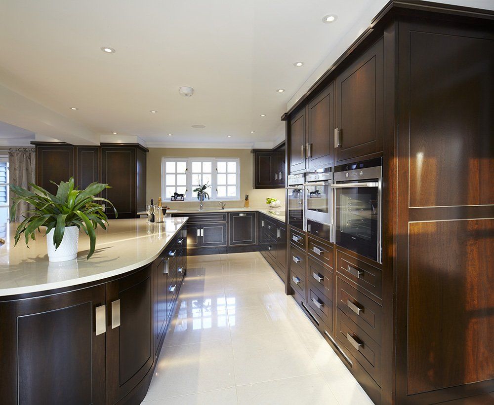 Contemporary Black Walnut kitchen cupboards