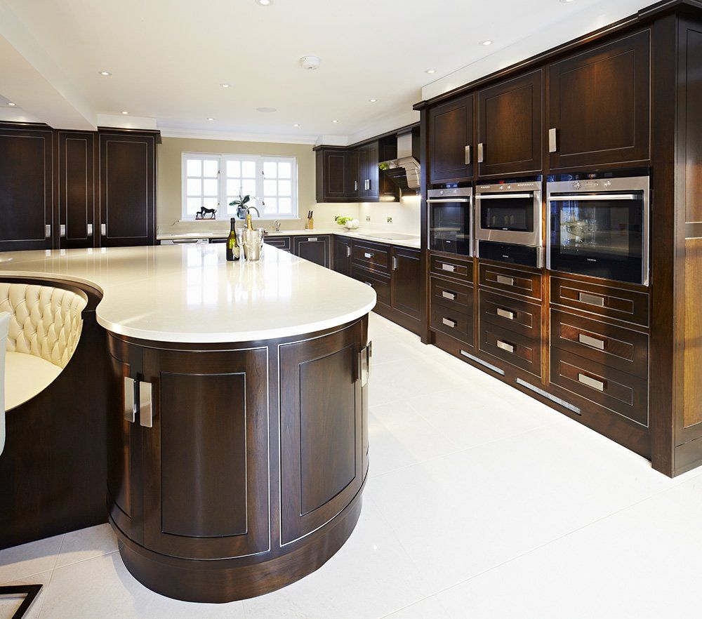 Contemporary Black Walnut curved cupboards