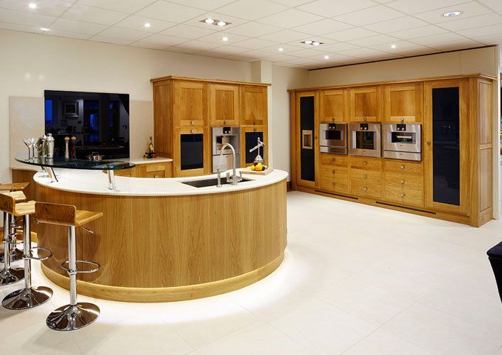 Modern Curved Oak kitchen cupboards