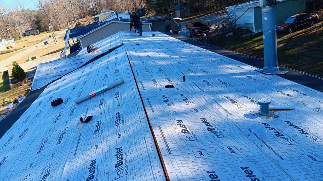 Roof covered in white underlayment