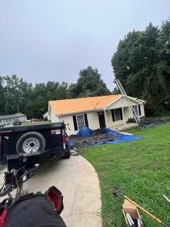 House with partially replaced roof