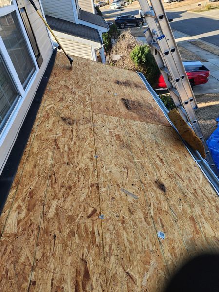 View of roof with exposed plywood
