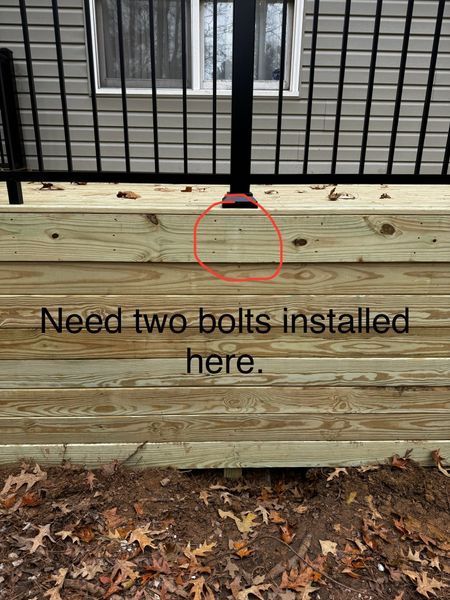 Deck railing post on wooden steps