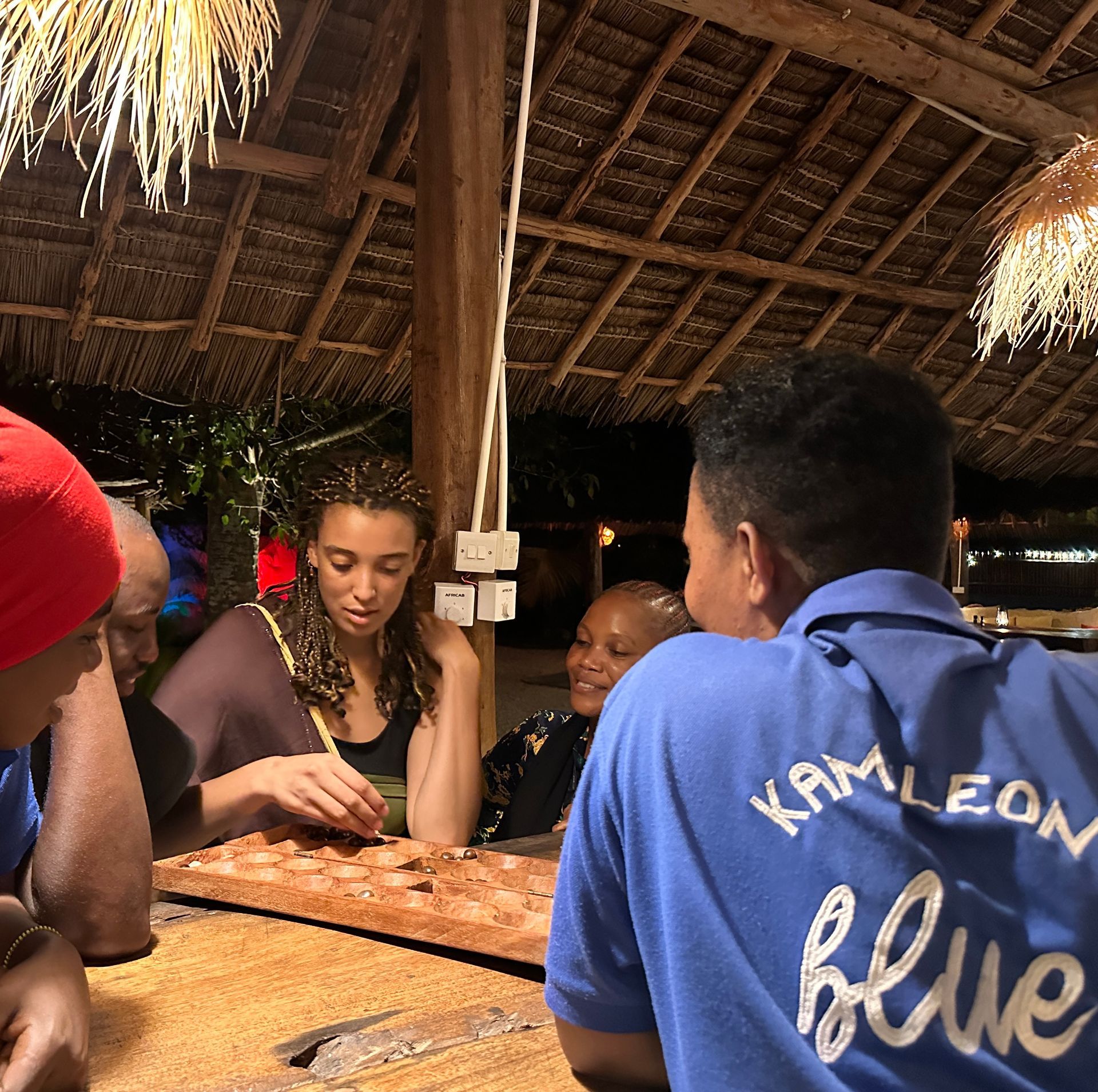 A man wearing a blue shirt that says blue on it