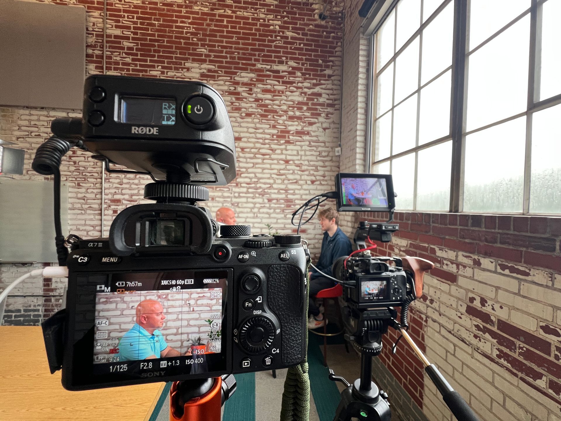 Cameras recording  a conversation