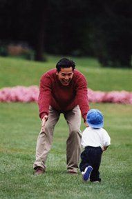 Boy Running to Father - We Care in Corona, CA
