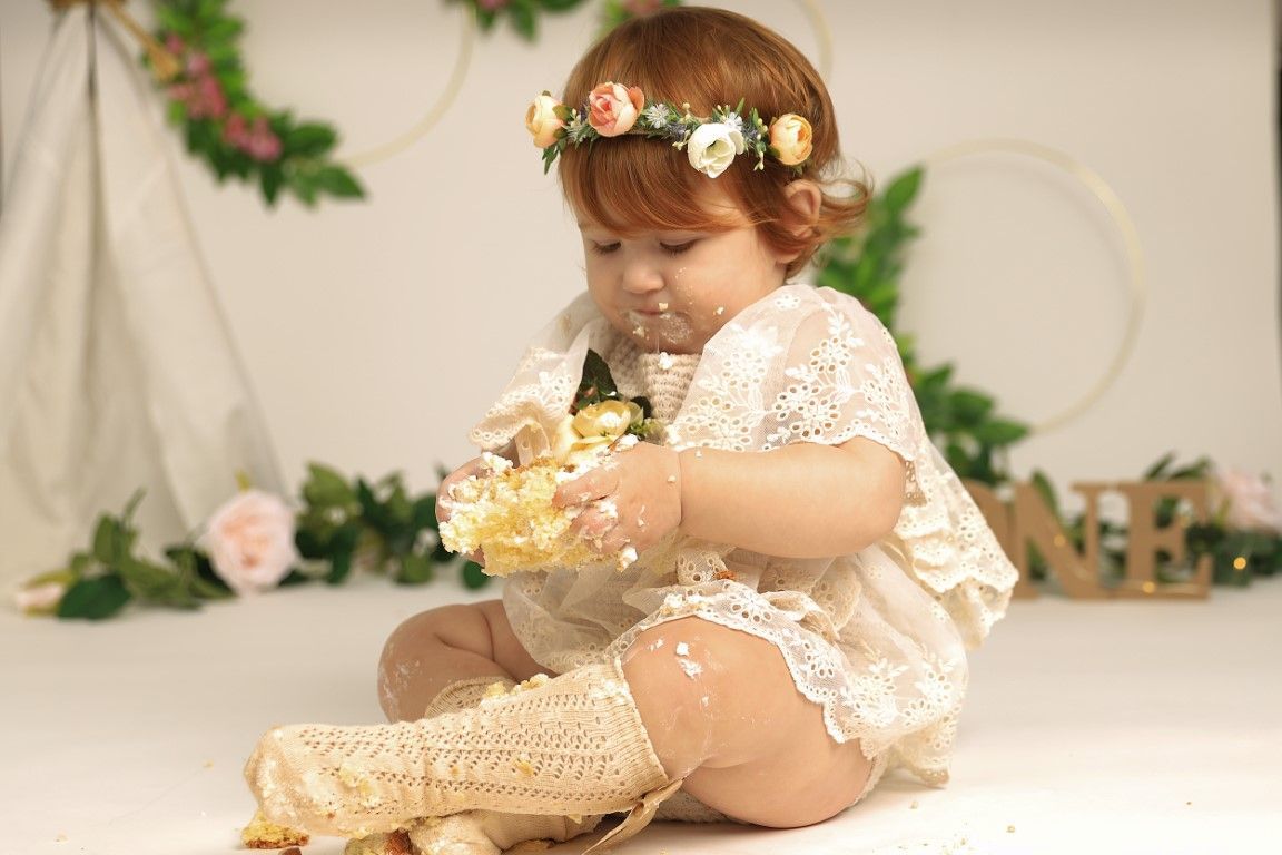Baby with face smached in cake