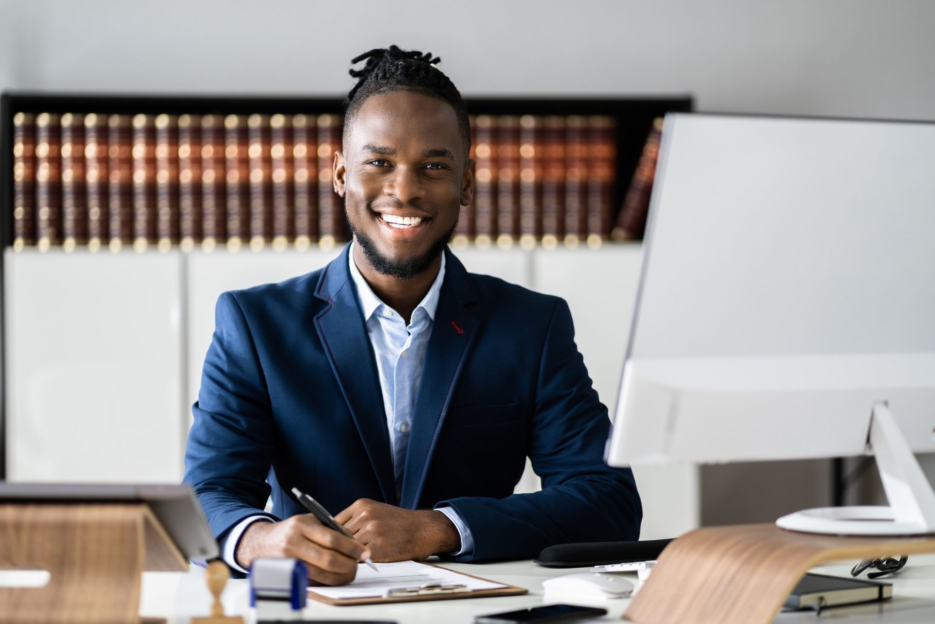 Attorney at desk representing law firms partnering with Growth Reach Digital for lead generation and online visibility.