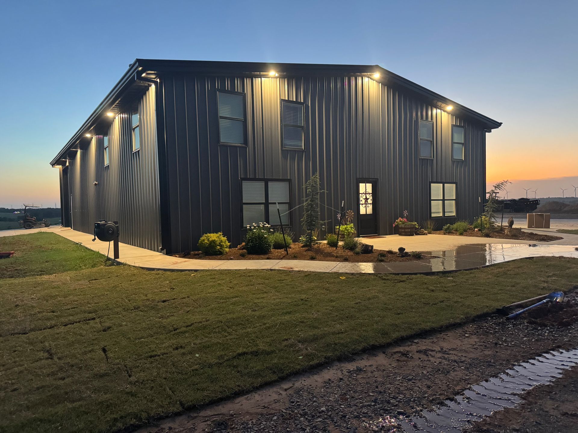 A person in a white apron is working in a kitchen