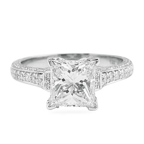 Princess-cut diamond engagement ring with split shank pavé band