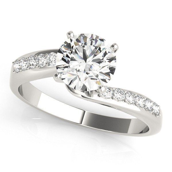 Round diamond engagement ring with twisted pavé band in white gold