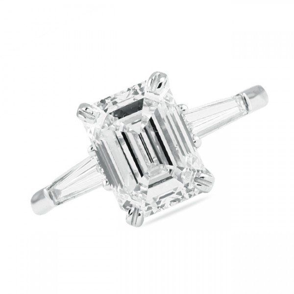 Emerald cut diamond engagement ring with tapered baguette side stones in white gold