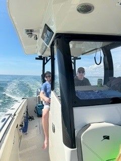 People Driving a Boat — Murrells Inlet, SC — Diamond Nautical