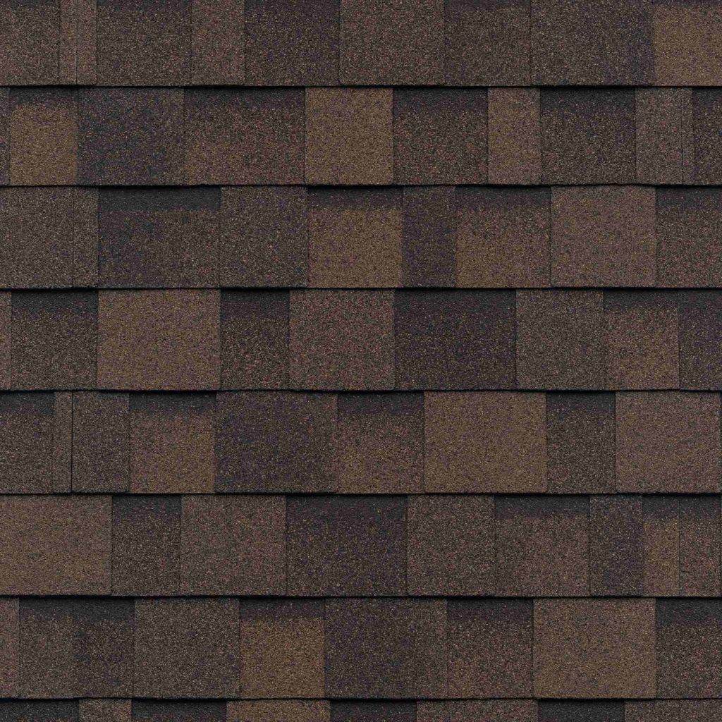 A close up of a brown shingle roof.