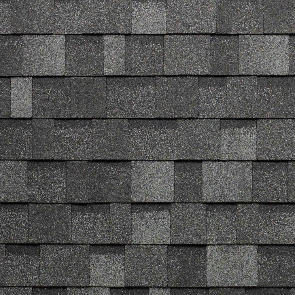 A close up of a roof with shingles on it.