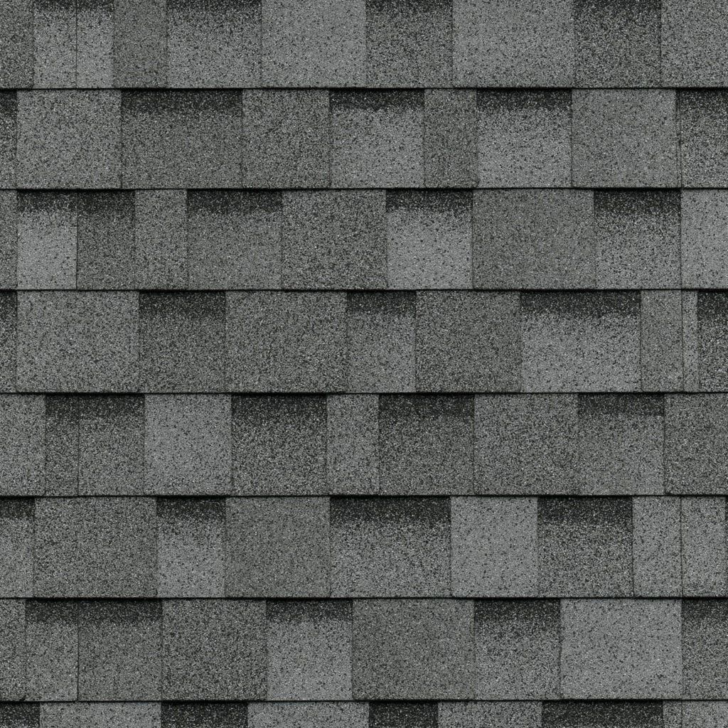 A close up of a roof with shingles on it.
