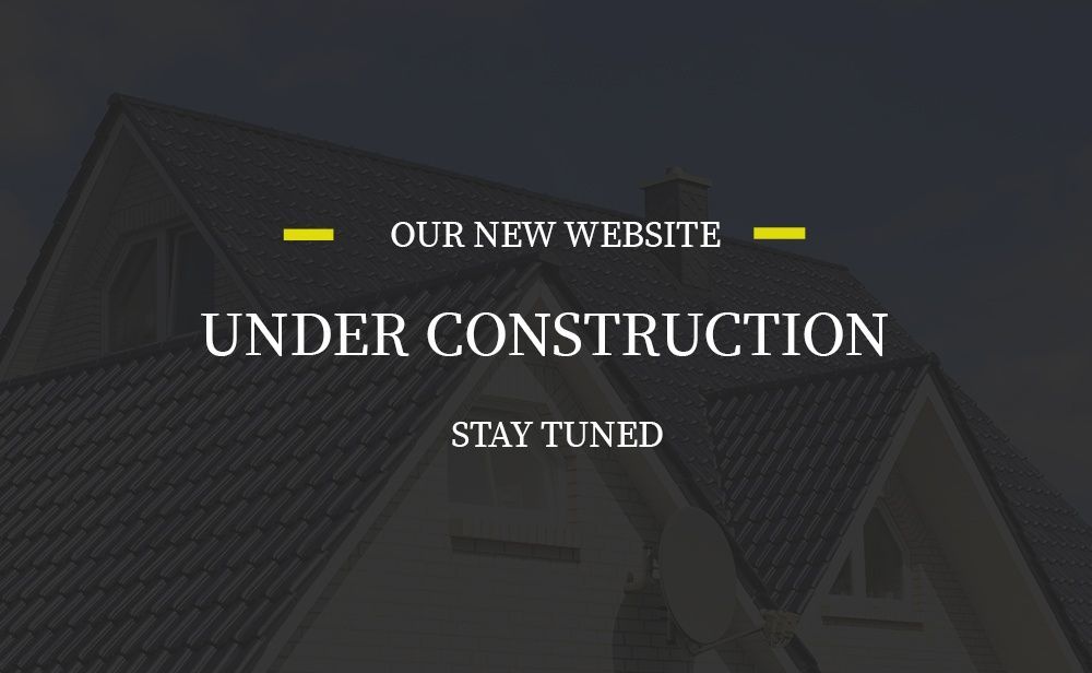 A sign that says our new website under construction