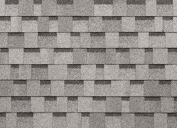 A close up of a roof with shingles on it.