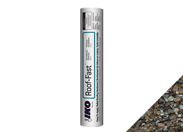 A roll of roof fast is sitting on top of a pile of rocks.