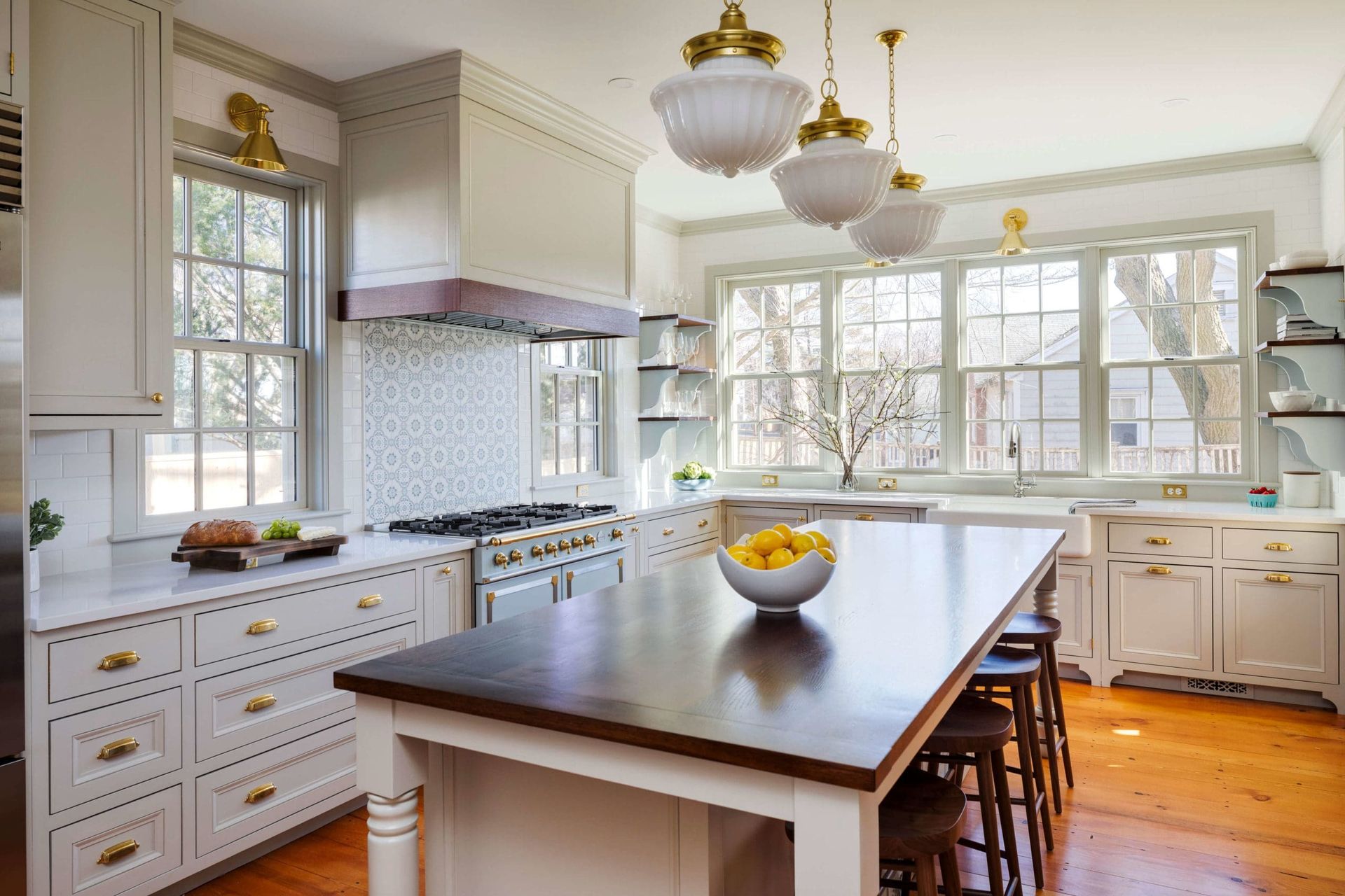 There is a large island in the middle of the kitchen.