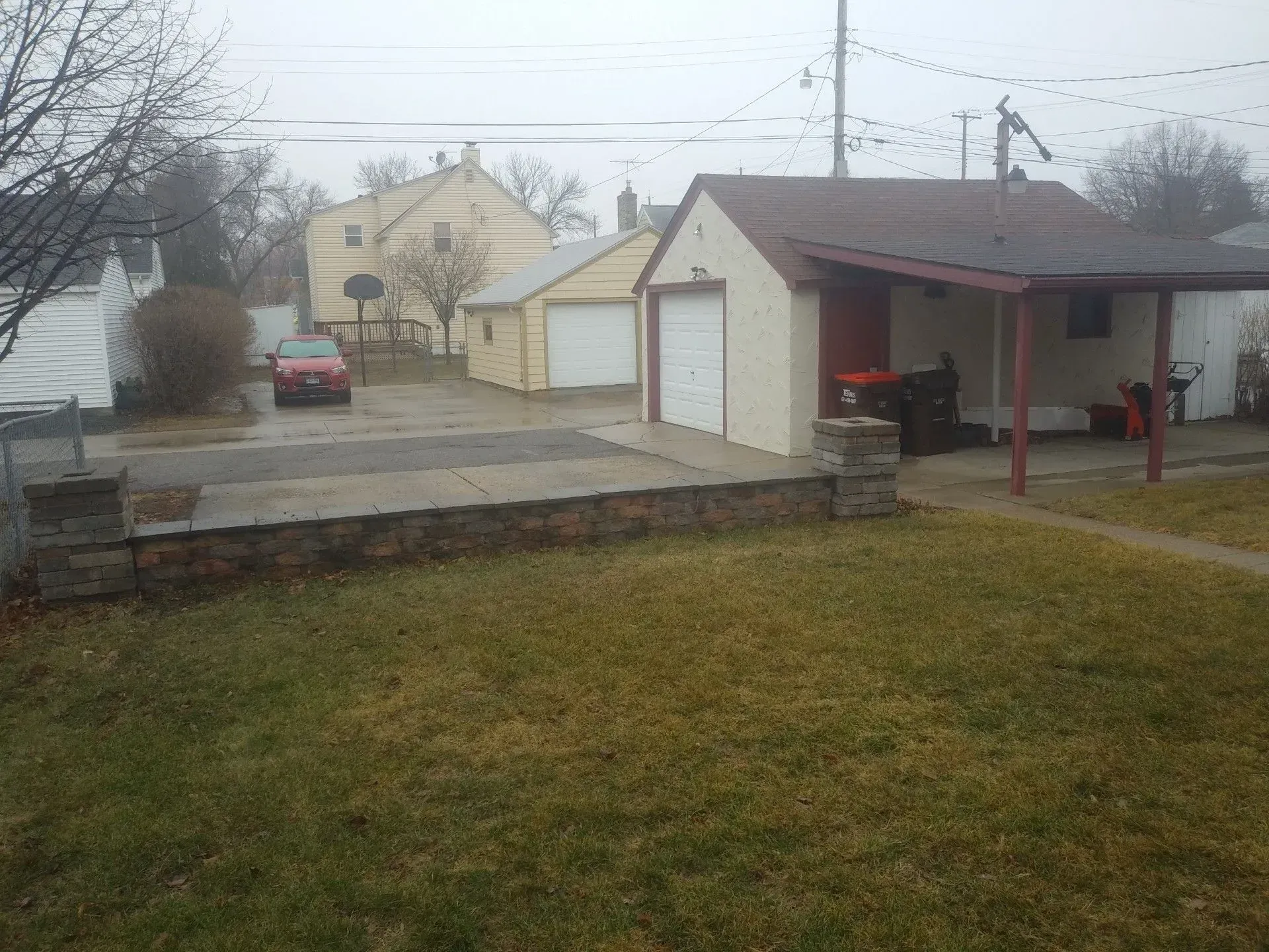 A suburban backyard on an overcast day. 