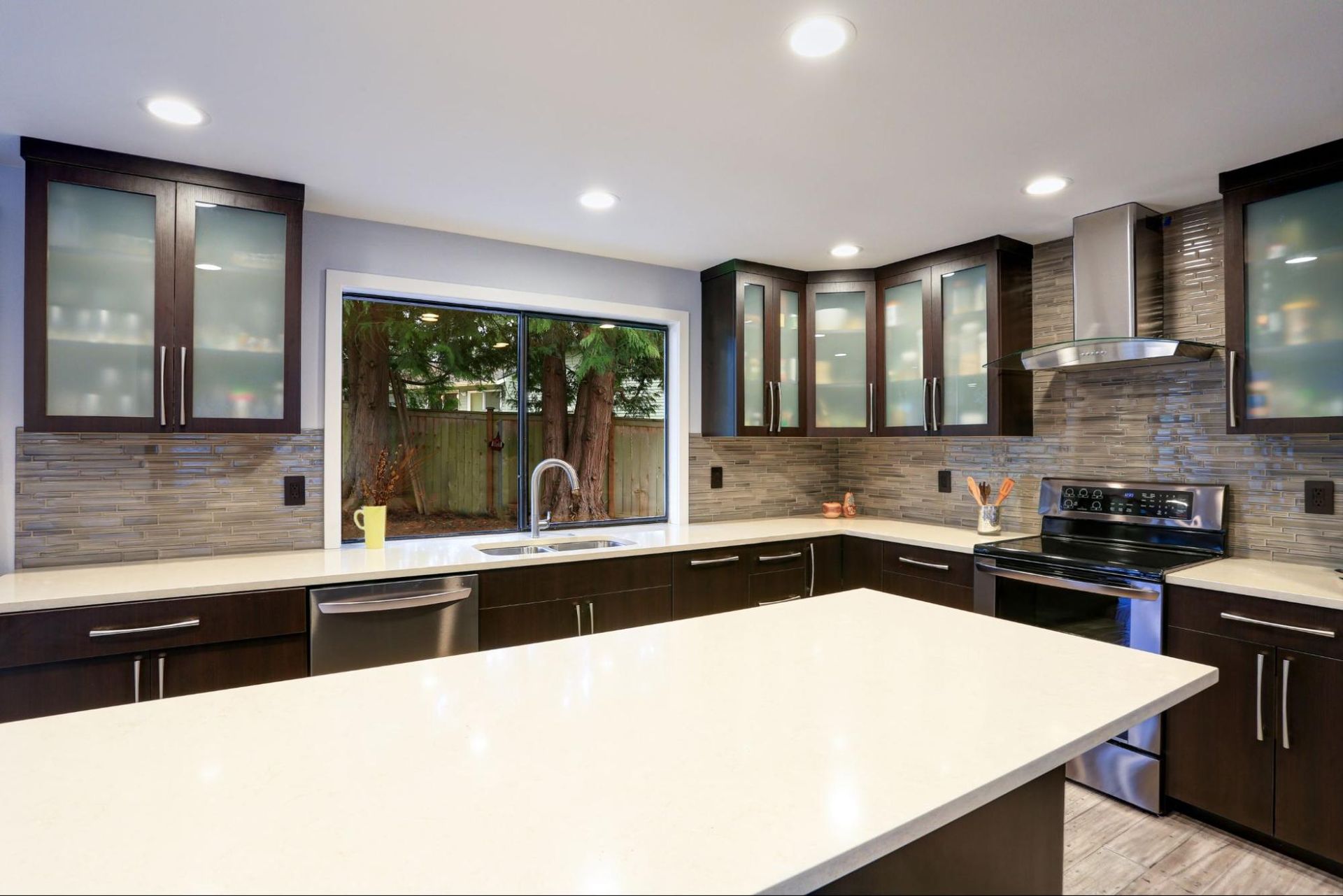 There is a large island in the middle of the kitchen.
