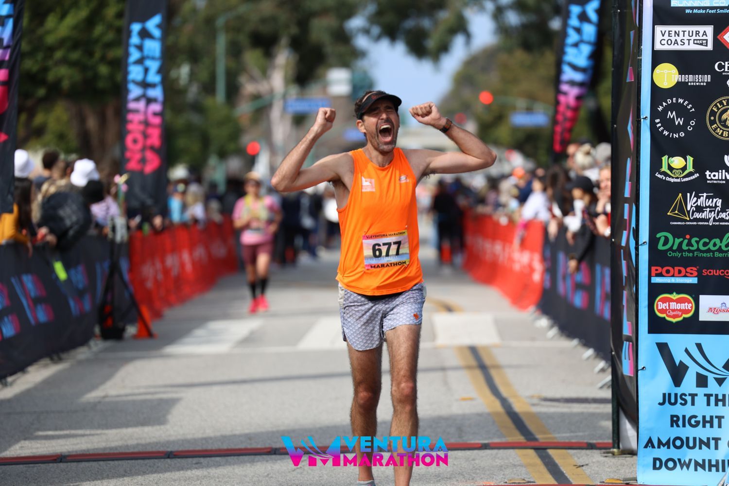 Runner excited to finish the Ventura Marathon.