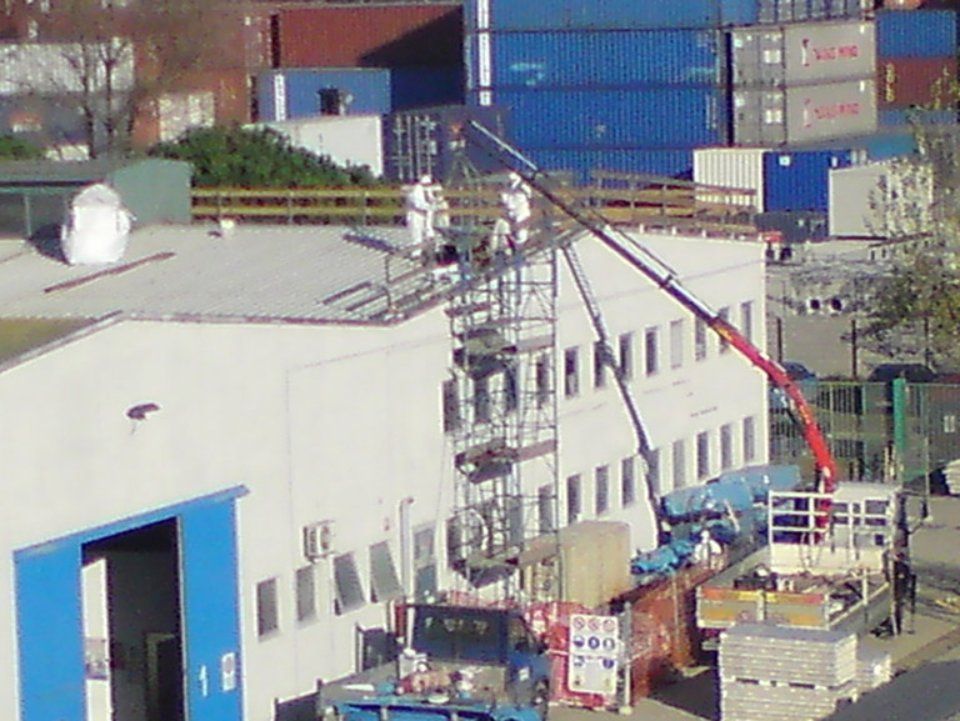 realizzazione di una copertura con piattaforma aerea