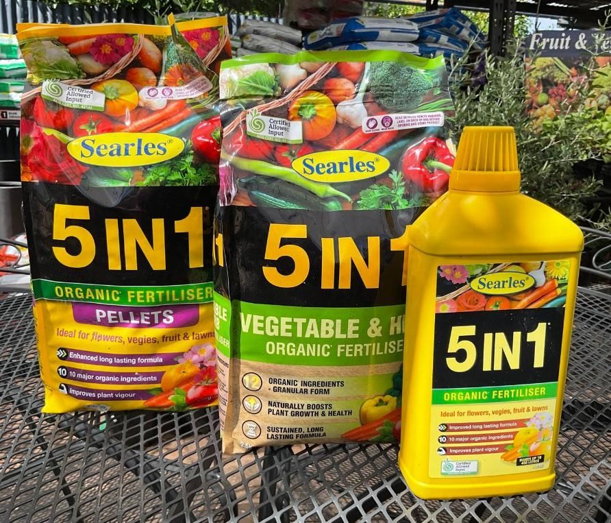 Several Bags Of Indoor Potting Mix Are Sitting On A Table — Magnolia Nursery In Dubbo, NSW