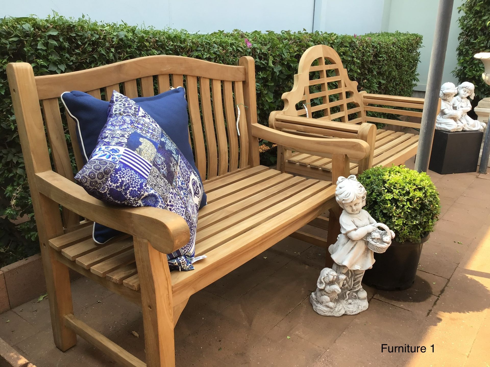Teak Wooden Doves - Magnolia Nursery, Dubbo NSW