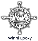 Winni Epoxy logo with compass rose and pine trees above the text “Winni Epoxy”