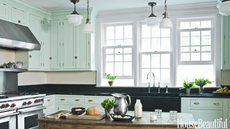 Adding a colored back-splash to the walls would add even more color to this kitchen.