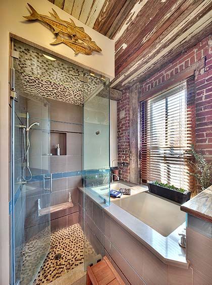 Rhino Builders Remodel + Design, took this master bath and turned it into a REMY-award-winning oasis.