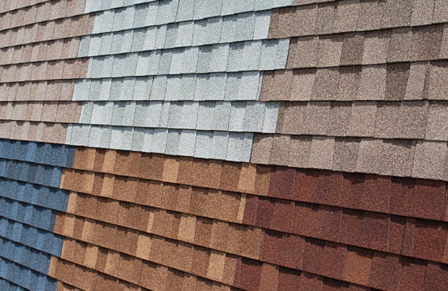 multiple styles and colors of asphalt shingles displayed